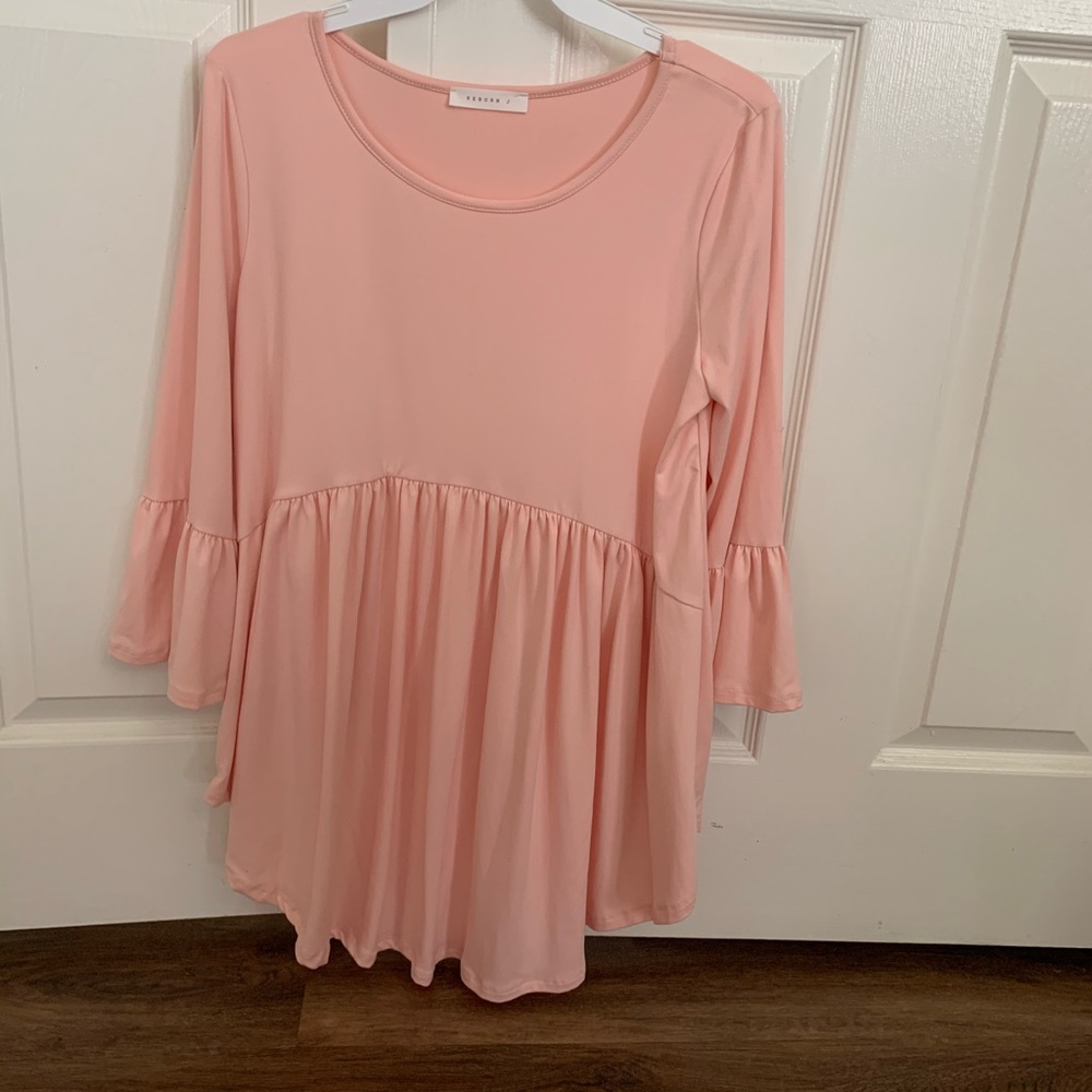 Small “reborn” top